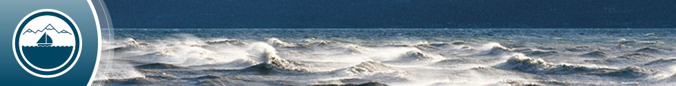auf dem Banner ist links ein Schiff als Piktogramm dargestellt und rechts eine Wasseroberfläche mit aufgepeischten Wellen zu sehen